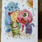 Outlet - Potwór z białym tłem, kartka z napisem "Sto lat" na urodziny, dla dzieci